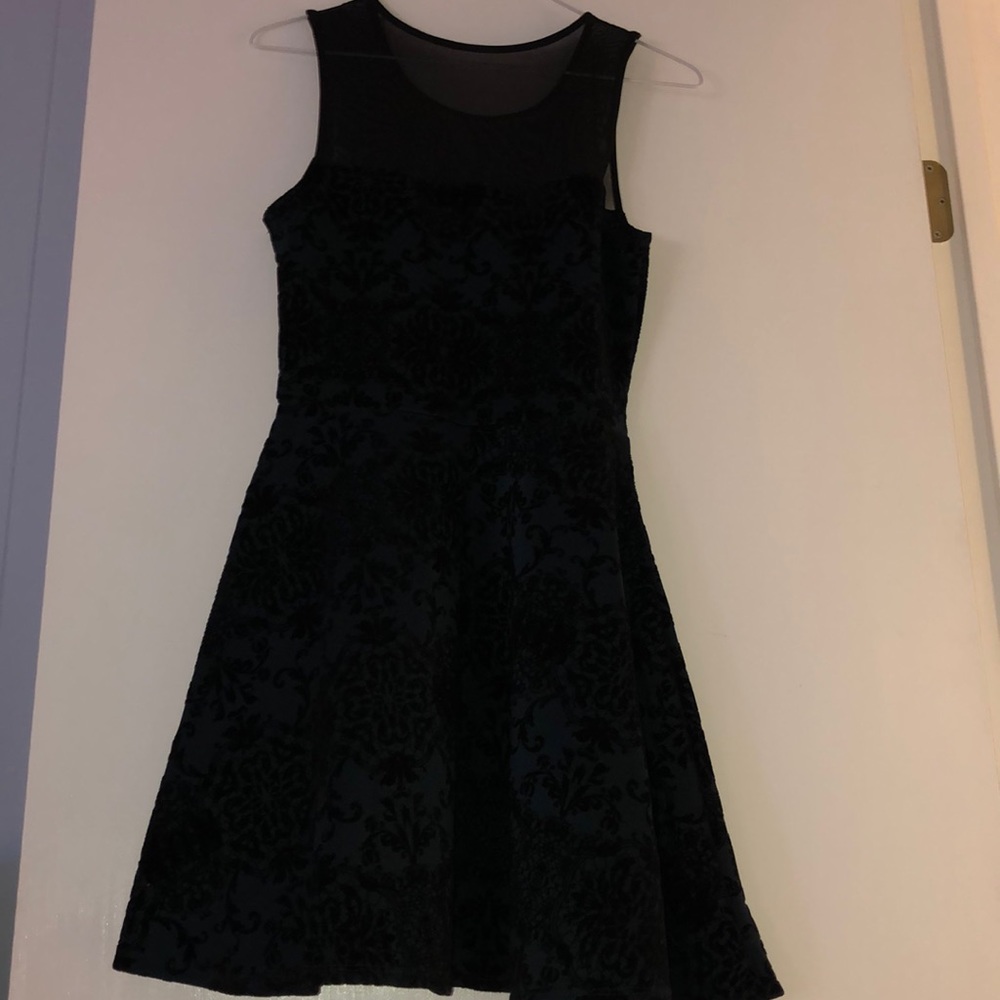 Green dress with a velvet design